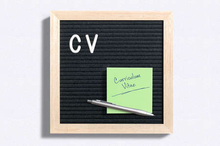 letter board with message "CV" and sticky note with text "curriculum vitae" on white backgroundの写真素材