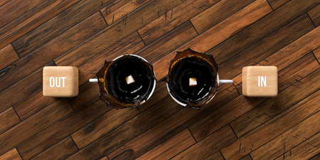 cups of coffee and cubes with text OUT and IN on wooden background - 3D rendered illustrationの写真素材