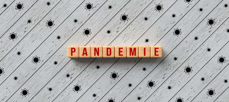 cubes with message PANDEMIC in German and virus symbols on wooden background - 3D rendered illustrationの写真素材
