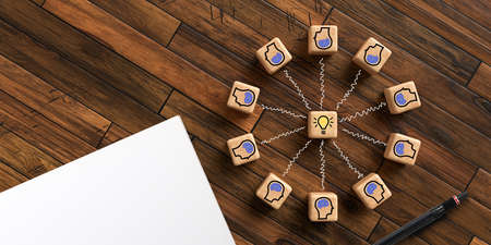 cubes showing a brainstorming session on wooden background