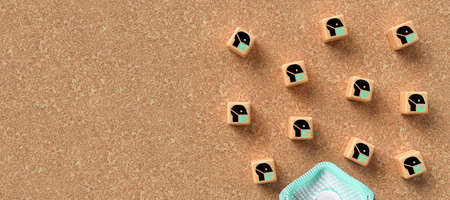 many cubes with people in face masks symbols with a ffp3 mask on cork background