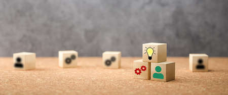 cubes showing a brainstorming session on concrete background - 3d illustration