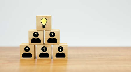 cubes showing a brainstorming session on wooden floor - 3d illustration