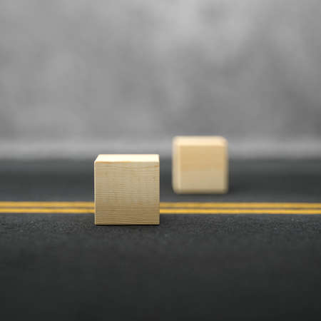 empty cubes for own message on asphalt street and conrete background - 3d illustrationの写真素材