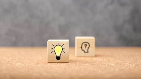 cubes showing a brainstorming session on concrete background - 3d illustration