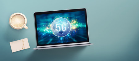 computer showing a cloud with a world map and message 5G floating in front an abstract grid pattern