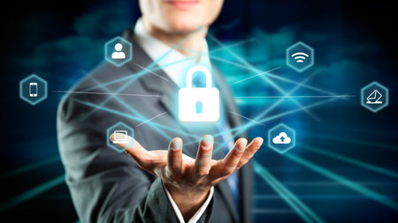 businessman with digital interface showing devices around a lock symbol on abstract backgroundの写真素材