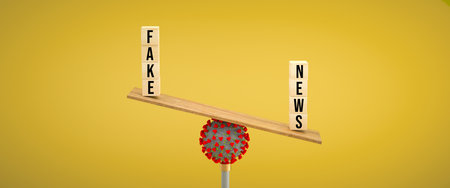 wooden scale balancing cubes with message FAKE and NEWS on a corona virus on colorful background - 3d illustrationの写真素材