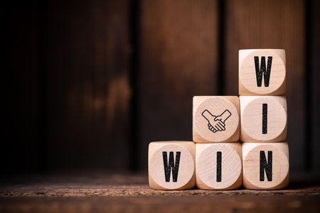 wooden cubes with message WIN WIN on wooden backgroundの写真素材