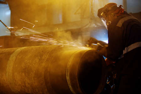 Welding of the pipeline. Process of creation of welding connection by the special mobile machine.の写真素材