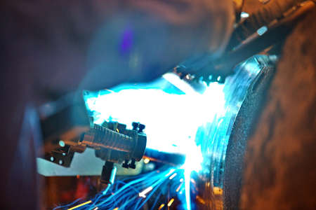 Welding of the pipeline. Process of creation of welding connection by the special mobile machine.の写真素材