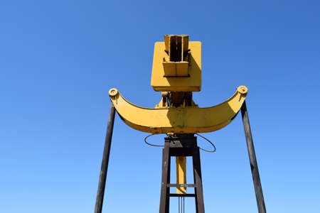 The pumping unit as the oil pump installed on a well. Equipment of oil fields.の写真素材