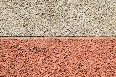 Background from the cement which is shaken up to foam on a wall. Texture of finishing of walls.の写真素材