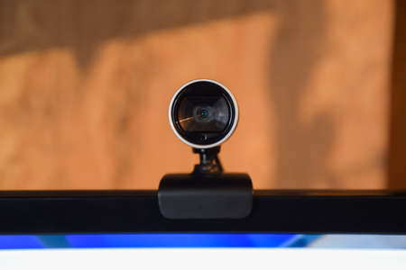 Web camera, attached to the monitor. Equipment for video.