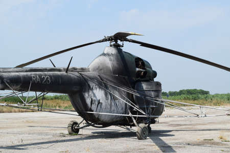 Old helicopter spraying fields. Helicopter spraying fertilizer.の写真素材