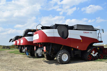Russia, Poltavskaya village - September 6, 2015: Combine harvesters Torum. Agricultural machinery.のeditorial素材