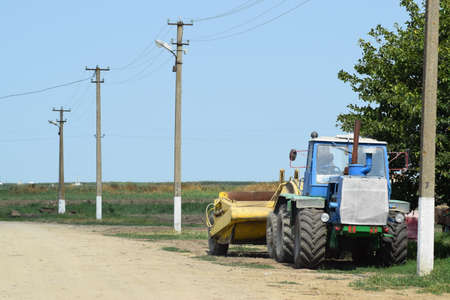 Russia, Temryuk - 15 July 2015: Tractor, standing in a row. Agricultural machinery. Parking of agricultural machinery.のeditorial素材