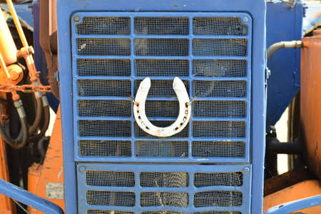 Tractor, standing in a row. Agricultural machinery. Parking of agricultural machinery.の写真素材
