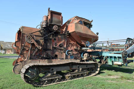 Tractor, standing in a row. Agricultural machinery. Parking of agricultural machinery.の写真素材