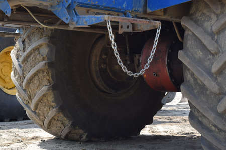 Tractor, standing in a row. Agricultural machinery. Parking of agricultural machinery.の写真素材