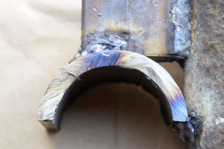 Welding parts racks rods by electric welding. Traces of the use of grinding machines and welding.