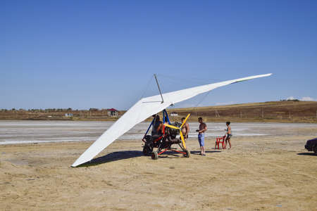 Russia, Veselovka - September 6, 2016: trike on the salt lake. Preparing for flightのeditorial素材