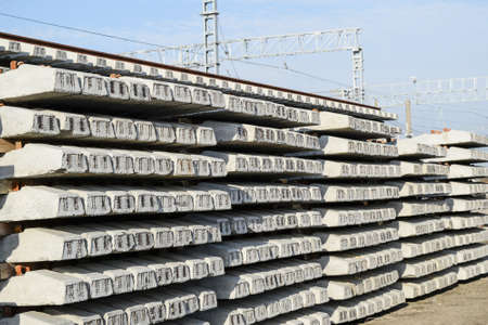 New rails and sleepers. The rails and sleepers are stacked on each other. Renovation of the railway....