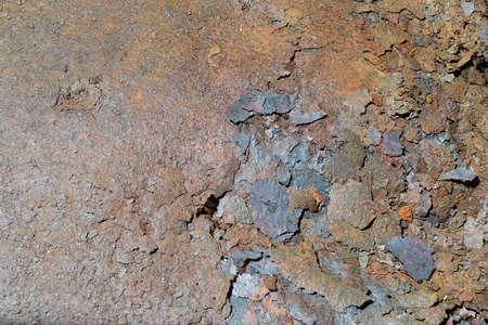 Flakes of rust on a sheet of rusty iron. Background of rust. Corrosion of metal.の写真素材