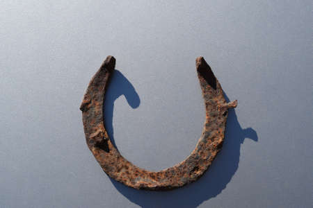 Old rusty horseshoe. Symbol for good luck and good fortune.の写真素材