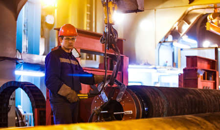 Safety at work. Welding and installation of the pipeline. Industrial weekdays welders and fitters.
