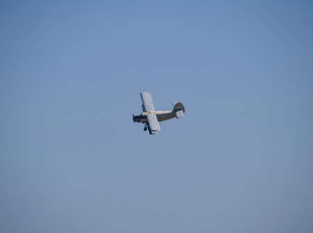 Aircraft agricultural aviation AN-2. The spraying of fertilizers and pesticides on the field with...