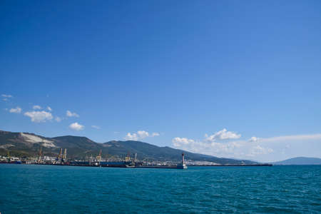 Novorossiysk, Russia - September 9, 2016: international seaports. Cargo port with port cranes. Sea bay and mountainous coast.の写真素材