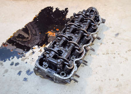 The head of the block of cylinders. The head of the block of cylinders removed from the engine for...