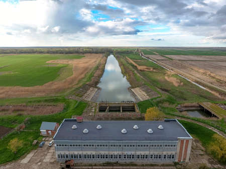 Water pumping station of irrigation system of rice fields. View from above.