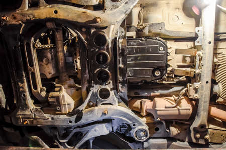 View of the car from below. Autoservice center. Car maintenance