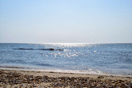 Sea line of the horizon. Sea and sky. The waves and glare of the sun are reflected from the waves of the sea. Seascapeの写真素材