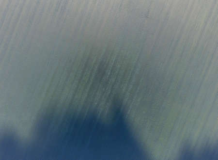 Texture of wheat field. Background of young green wheat on the field. Photo from the quadrocopter. Aerial photo of the wheat field.の写真素材