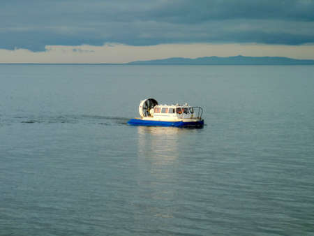 A small service ship in a cargo industrial port. A ship in the sea.の写真素材