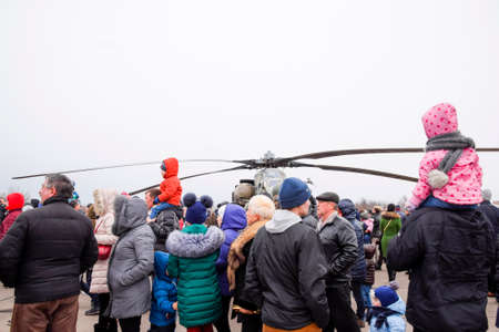 Krasnodar, Russia - February 23, 2017: Helicopters at the air show in Krasnodar. The audience is...