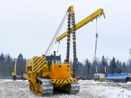 Surgut, Russia - September 17, 2007: A bulldozer with a lift on the construction of a pipeline in...