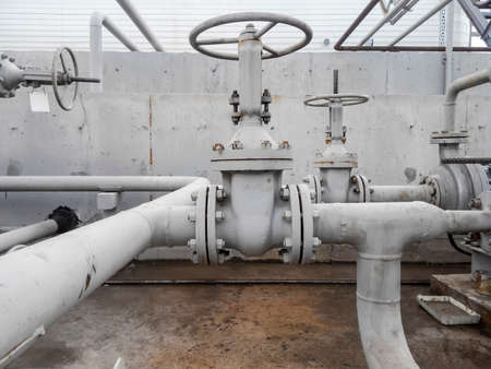 Latch on the pipeline. Oil refinery. Equipment for primary oil refining.