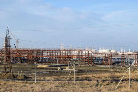 Distillation columns, pipes and other equipment furnaces refinery. The oil refinery. Equipment for primary oil refining.の写真素材