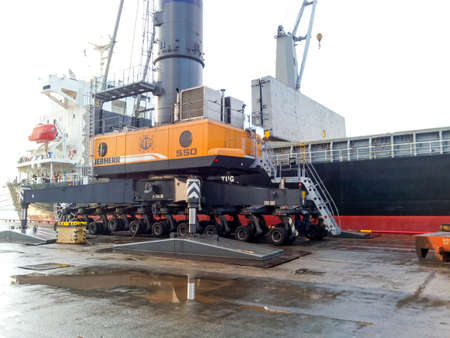 Novorossiysk, Russia - August 11, 2016: Self-propelled port crane. Mobile platform for moving the...