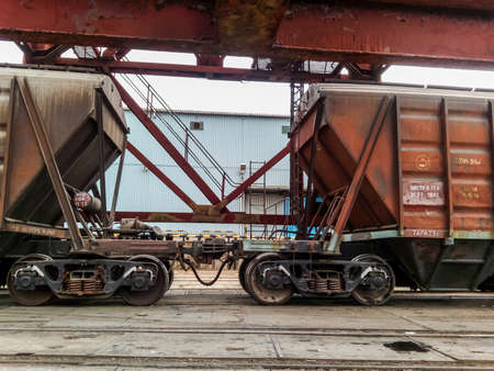 Novorossiysk, Russia - August 20, 2017: Freight railroad cars in the industrial port. Wagons hoppersのeditorial素材