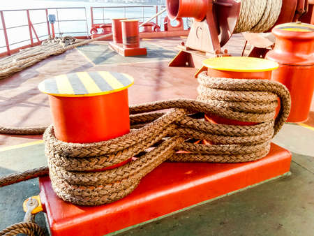 Mooring bollard on the decks of an industrial seaport