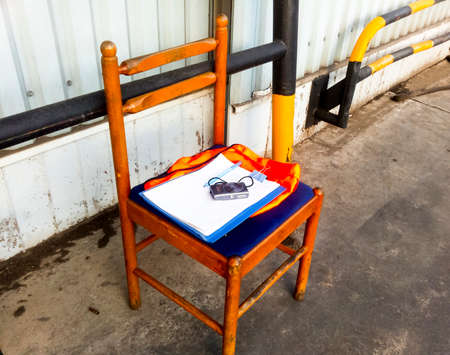 Novorossiysk, Russia - August 11, 2016: Chair with accounting documents. Camera to control the arrival of goods.のeditorial素材