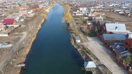 View from the top of the village. Streets without asphalt and single-storey houses. The Kuban...