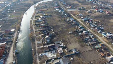 View from the top of the village. Streets without asphalt and single-storey houses. The Kuban...