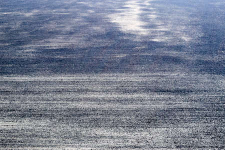 plowed field in the spring in the village. Agricultural land in the Kuban. Preparation of fields for sowing wheatの写真素材