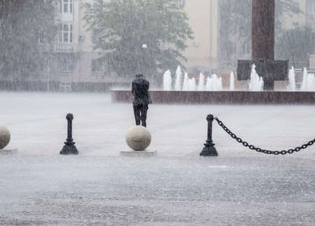 A heavy rain on the embankment of Novorossiysk. Heavy rain.の写真素材